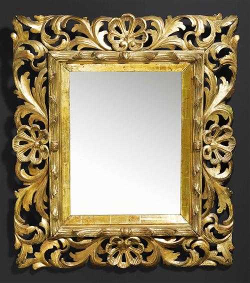 Appraisal: CARVED GILTWOOD MIRROR Baroque Italy th century With fine foliate