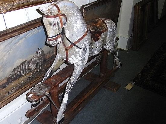 Appraisal: AN ANTIQUE CHILD'S ROCKING HORSE possibly Ayres with original painted