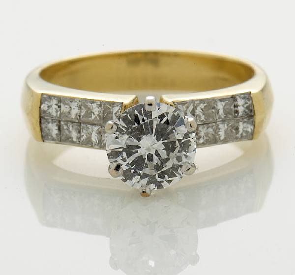 Appraisal: A diamond ring central diamond weighing approximately carat mounted in