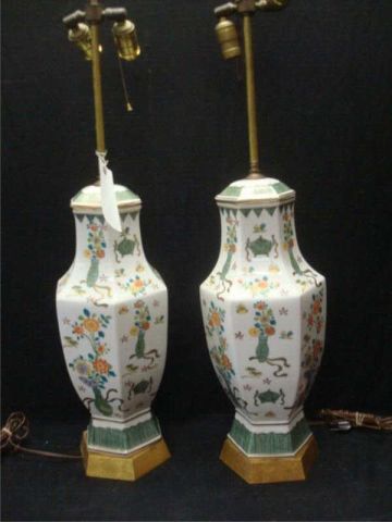 Appraisal: Pair of Asian Urn Form Lamps on Gilt Bases Dimensions