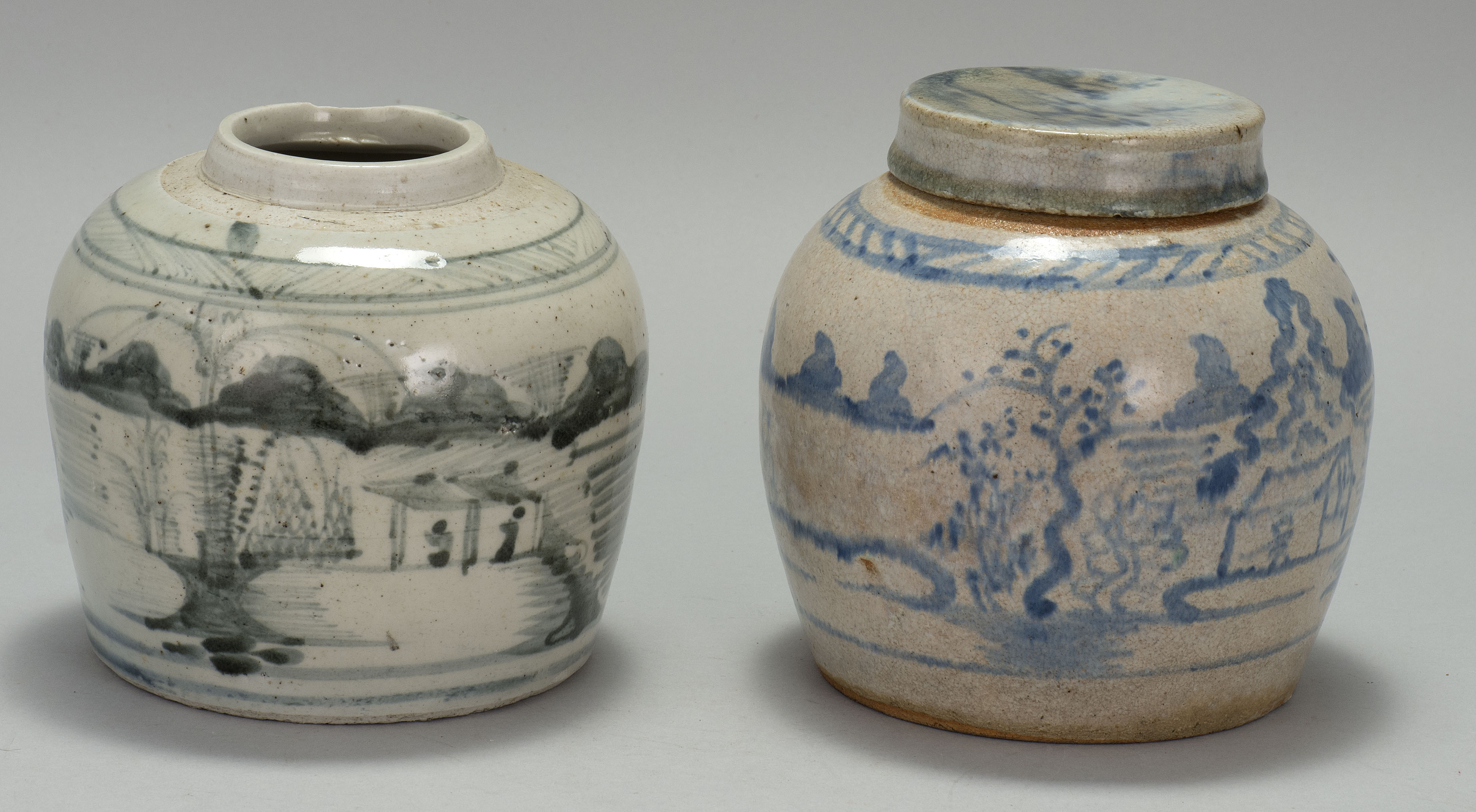 Appraisal: TWO BLUE AND WHITE STONEWARE JARS Late th CenturyWith landscape