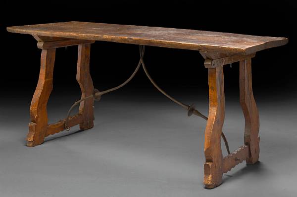 Appraisal: A Spanish Baroque walnut and oak table incorporating antique and