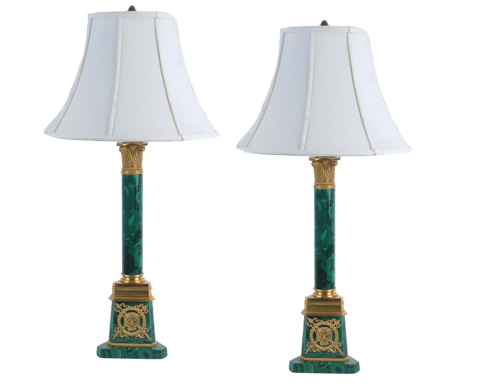 Appraisal: PAIR OF ORMOLU-MOUNTED MALACHITE COLUMN-BASE TABLE LAMPSProvenance The Estate of