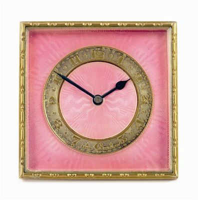 Appraisal: A brass and enamel easel back clock the day movement