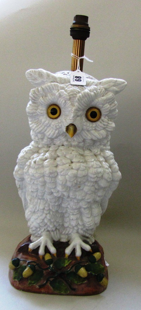 Appraisal: A German porcelain table lamp modelled as an owl late