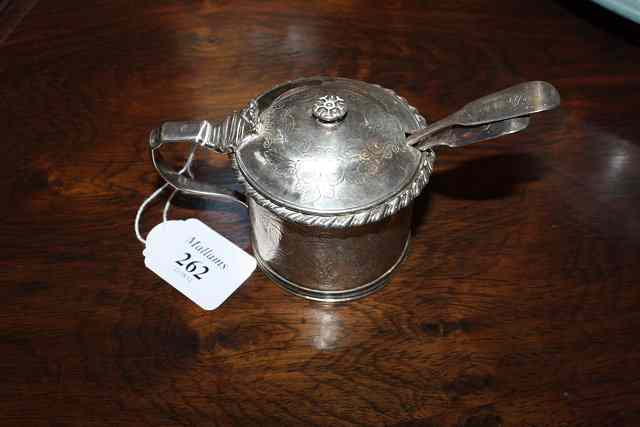 Appraisal: A VICTORIAN SILVER MUSTARD POT with engraved flower decoration domed