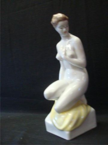 Appraisal: HOLLOHAZA porcelain figure of a woman Made in Hungary Signed