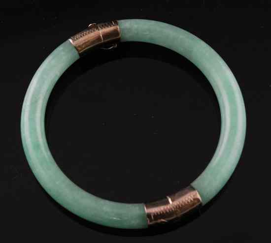 Appraisal: A Chinese gold mounted jade bracelet in Estimate - There