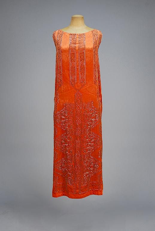 Appraisal: BEADED VELVET DINNER DRESS c Rust silk with an ethnic-inspired