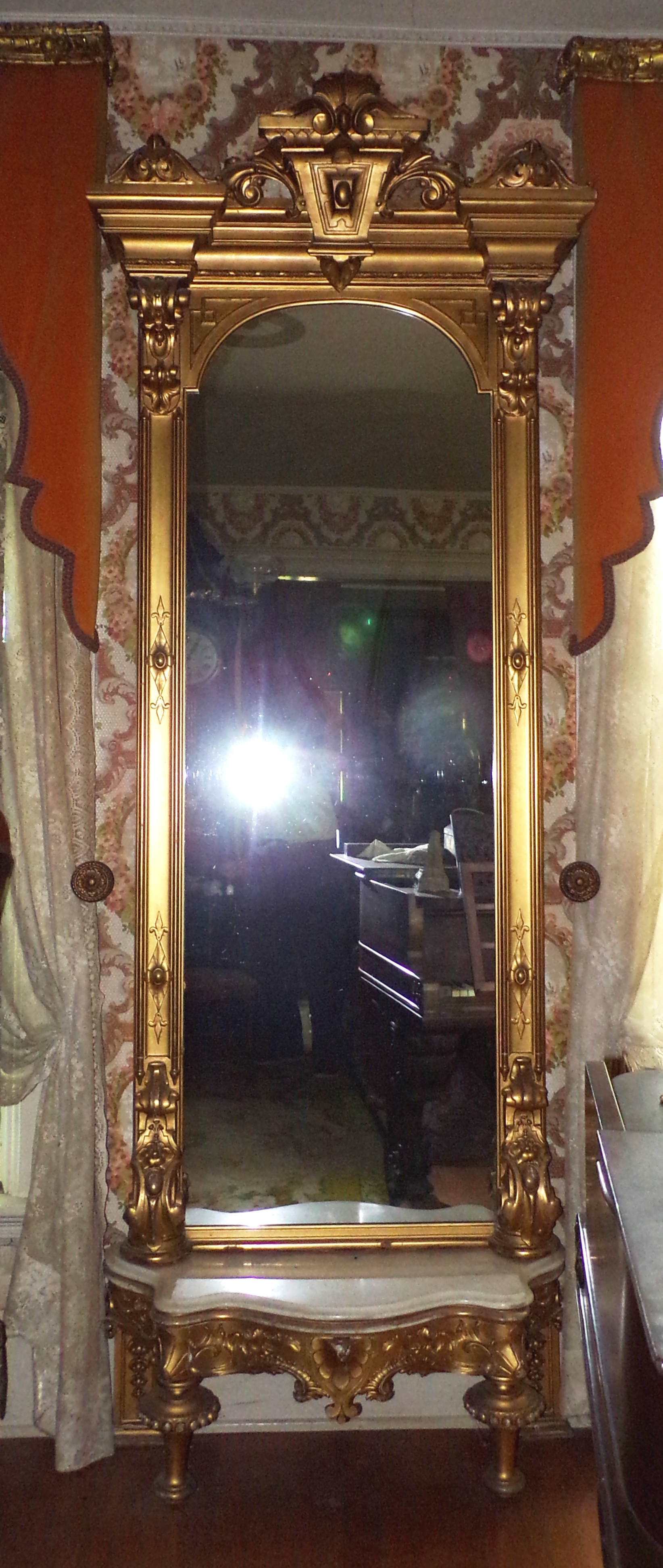 Appraisal: Victorian gilt pier mirror with serpentine front with a conforming