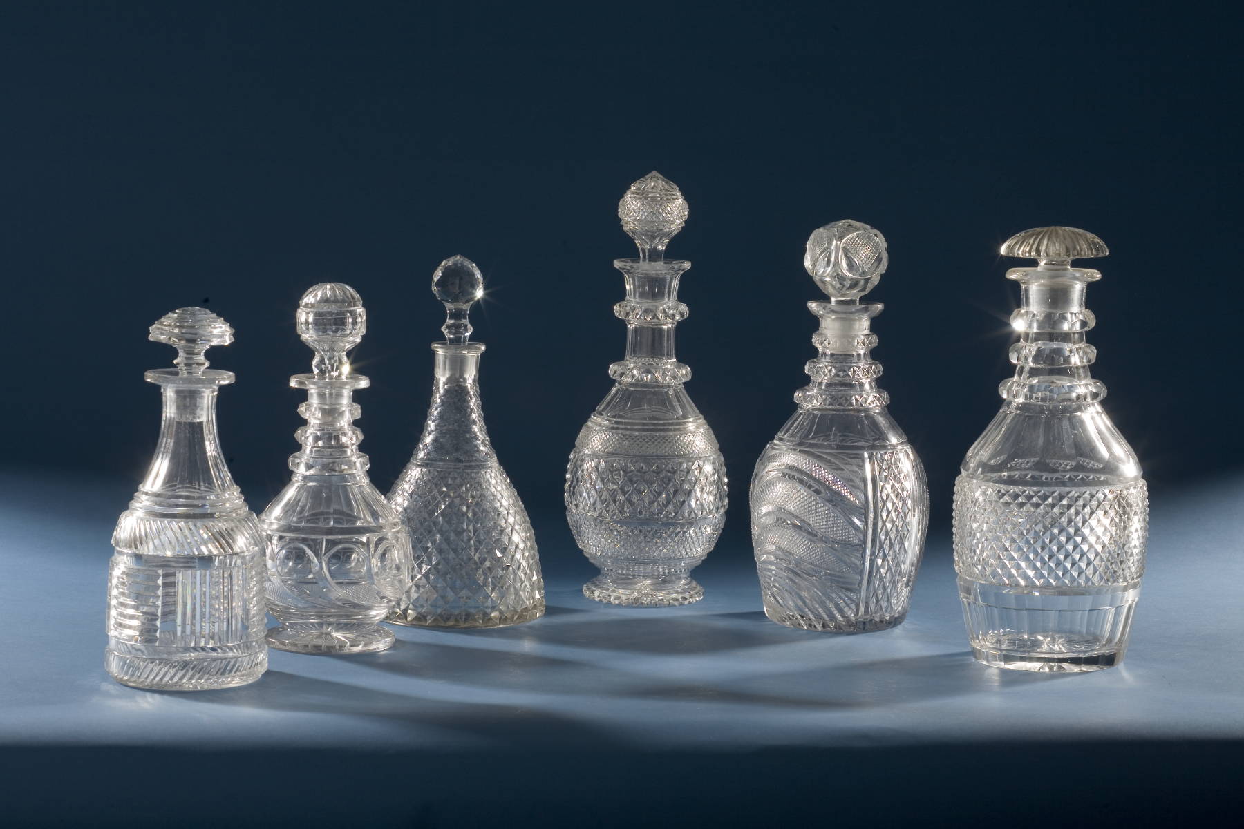 Appraisal: SIX ANGLO-IRISH CUT GLASS DECANTERS Height of tallest inches