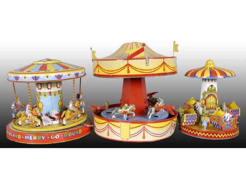 Appraisal: Lot of American Tin Merry-Go-Round Toys Description '' T Chein