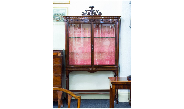 Appraisal: Mahogany Serpentine Fronted Display Cabinet Surmounted By A Carved Prince