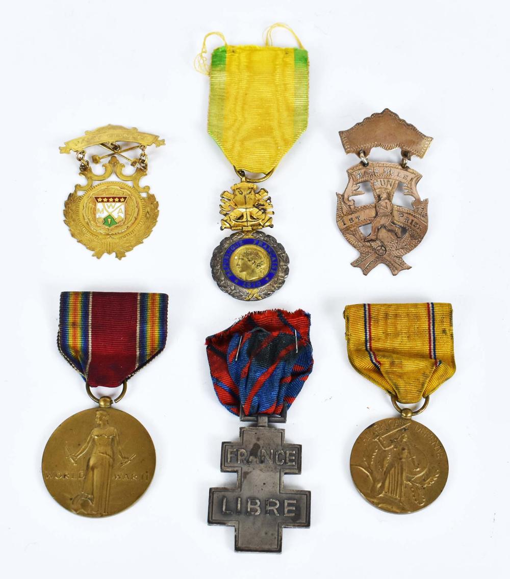 Appraisal: SEVEN WORLD WAR II RELATED MEDALS AND OTHERSSome with ribbons