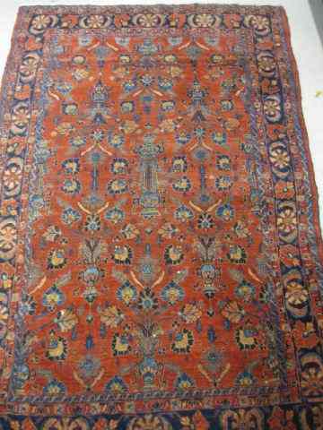 Appraisal: Sarouk Persian Handmade Rug semi-antique floral on red field '