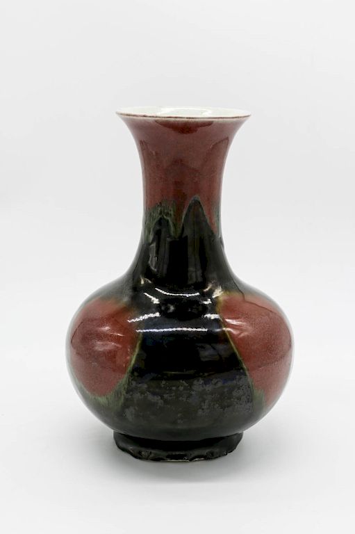 Appraisal: FLAMBE GLAZE VASE LATE QING Of a slightly compressed globular