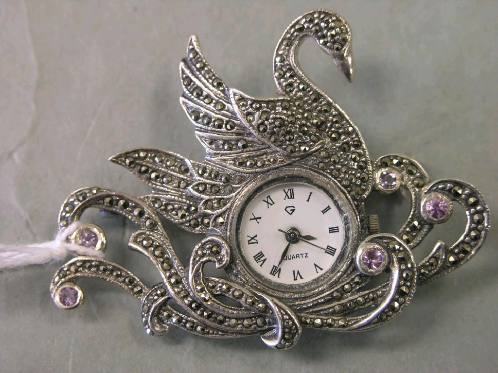 Appraisal: A Sterling silver and marcasite brooch-watch in the form of