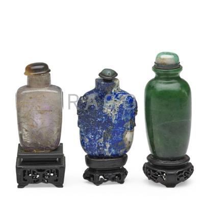 Appraisal: CHINESE SNUFF BOTTLES Three with spoons and bases th th