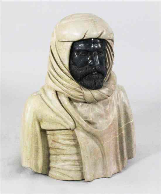 Appraisal: A modern two colour marble bust of a Blackamoor ins