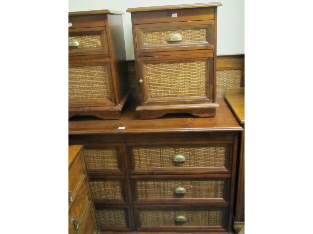 Appraisal: Modern hardwood and wicker chest of drawers with a pair