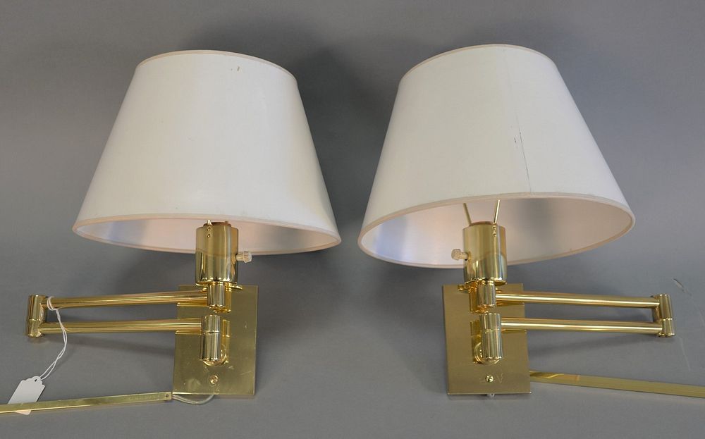 Appraisal: Pair of Hansen brass articulating wall mount lamps with all