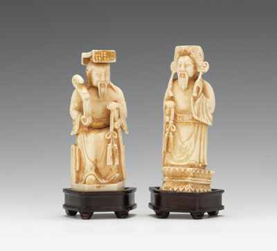 Appraisal: A Pair of Ivory Figures with Gilt Accents First a