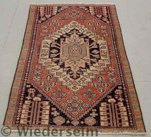 Appraisal: Persian oriental center hall carpet with a center geometric medallion