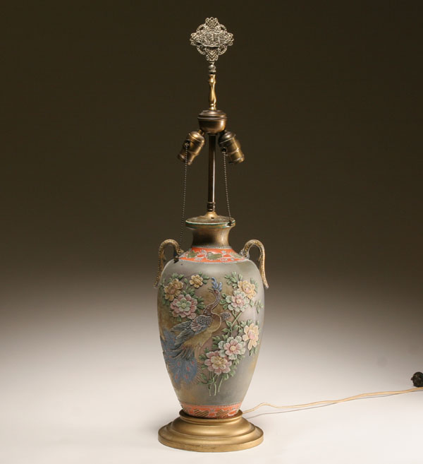 Appraisal: Nippon Moriage hand painted and enameled vasiform lamp double handled