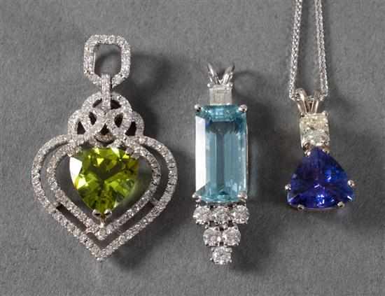 Appraisal: Two diamond and gemstone pendants together with a K gold