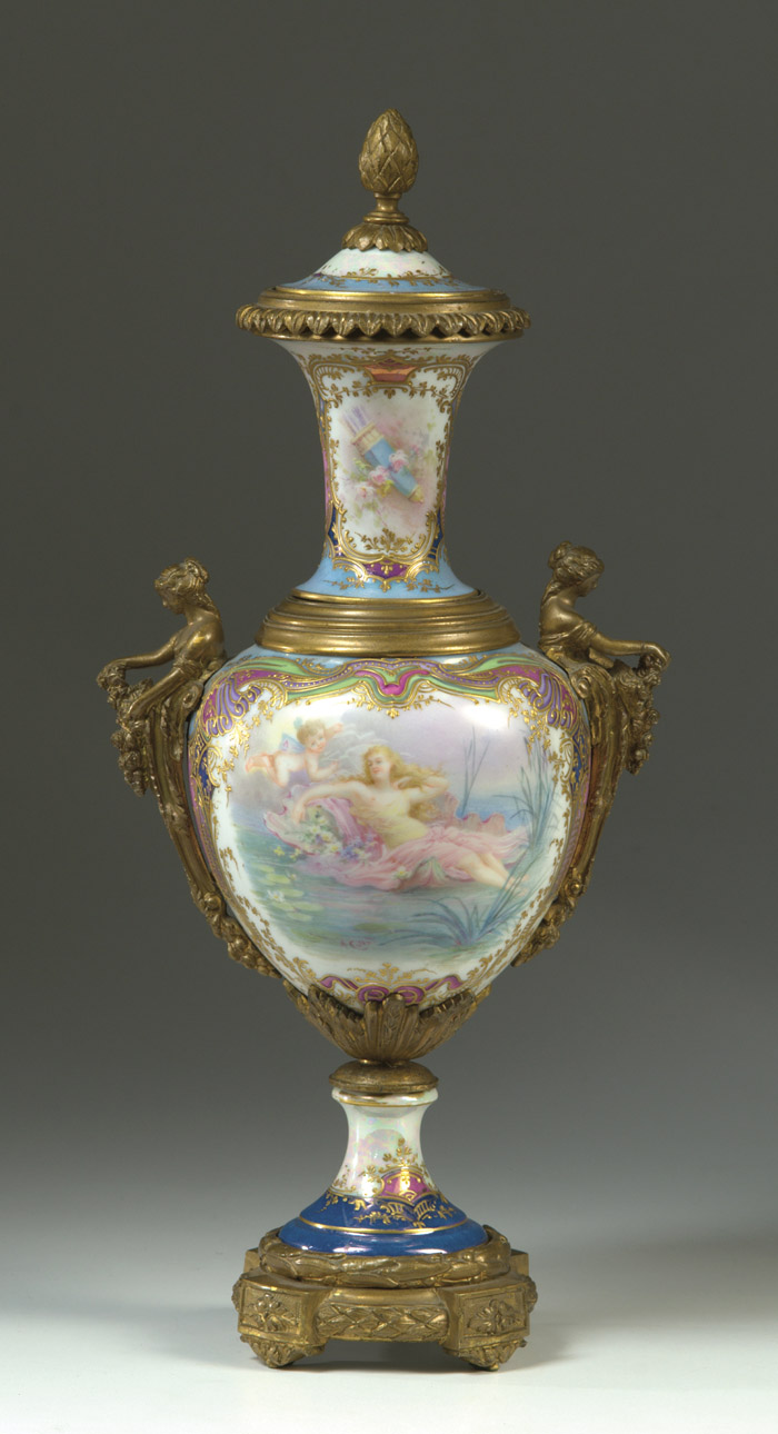 Appraisal: SEVRES STYLE BRONZE MOUNTED PORCELAIN URN hand painted with cupid