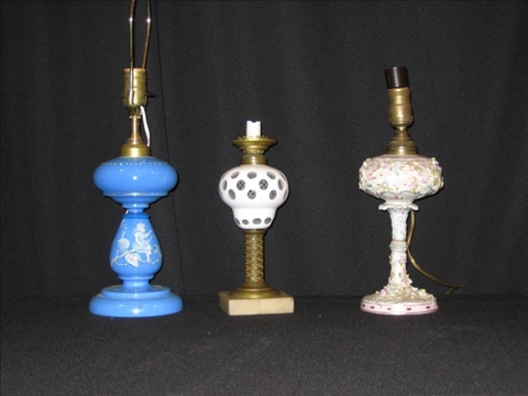 Appraisal: TWO GLASS LAMPS AND ONE PORCELAIN LAMP Includes a blue