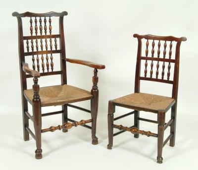 Appraisal: A HARLEQUIN SET OF EIGHT ELM SPINDLE BACK CHAIRS including