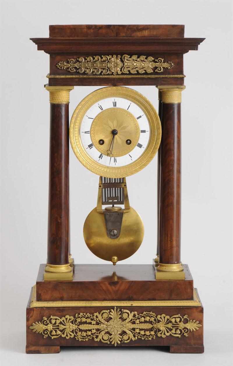 Appraisal: EMPIRE GILT-BRONZE MOUNTED MAHOGANY PILLAR CLOCK The in enamel chapter