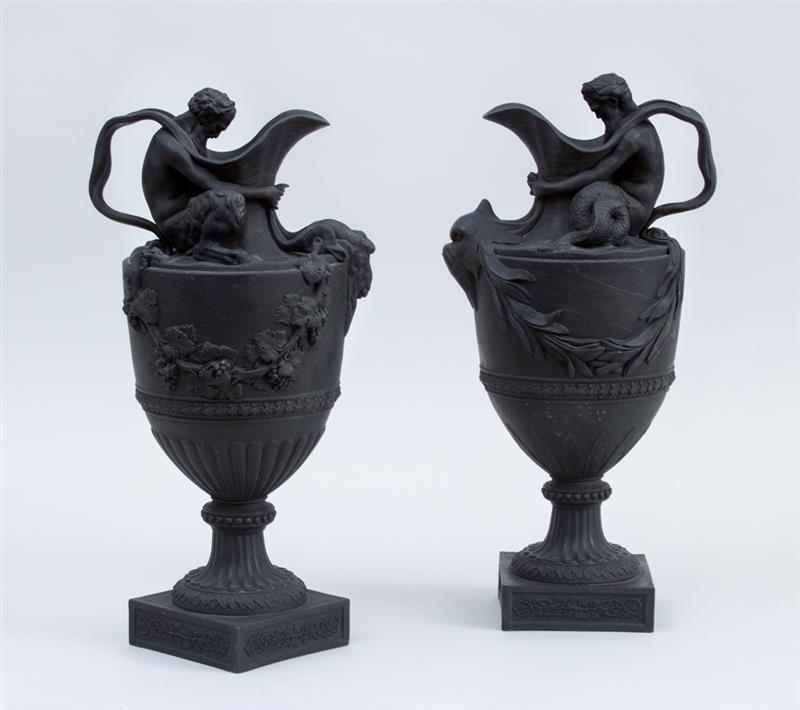 Appraisal: PAIR OF WEDGWOOD NEOCLASSICAL WEDGWOOD POTTERY BLACK BASALT EWERS Each