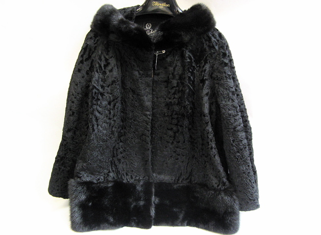 Appraisal: TWO FURS the first a caracul black lamb jacket with