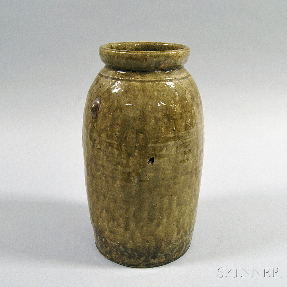 Appraisal: Tall Redware Jar probably southeastern United States elongated ovoid form