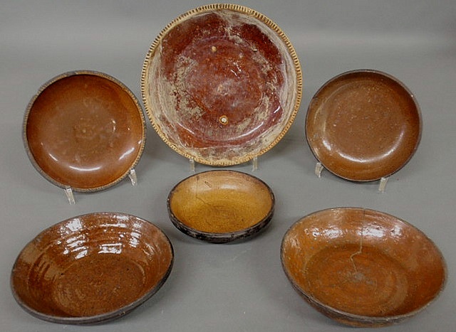 Appraisal: Five Pennsylvania redware pie plates th c each approx dia