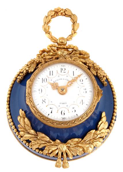 Appraisal: A small French gilt bronze wall timepiece retailed by Escalierde