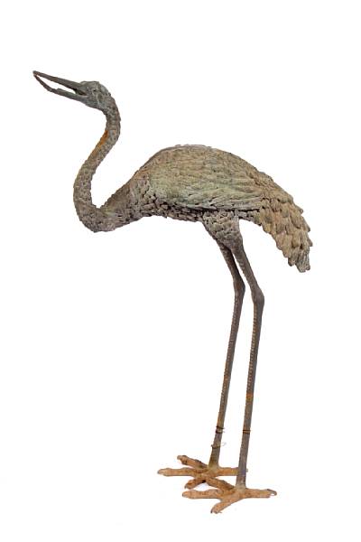 Appraisal: A pair of bronze garden cranes height of largest ft