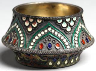 Appraisal: Pre The small body with colorful enameling in shades of