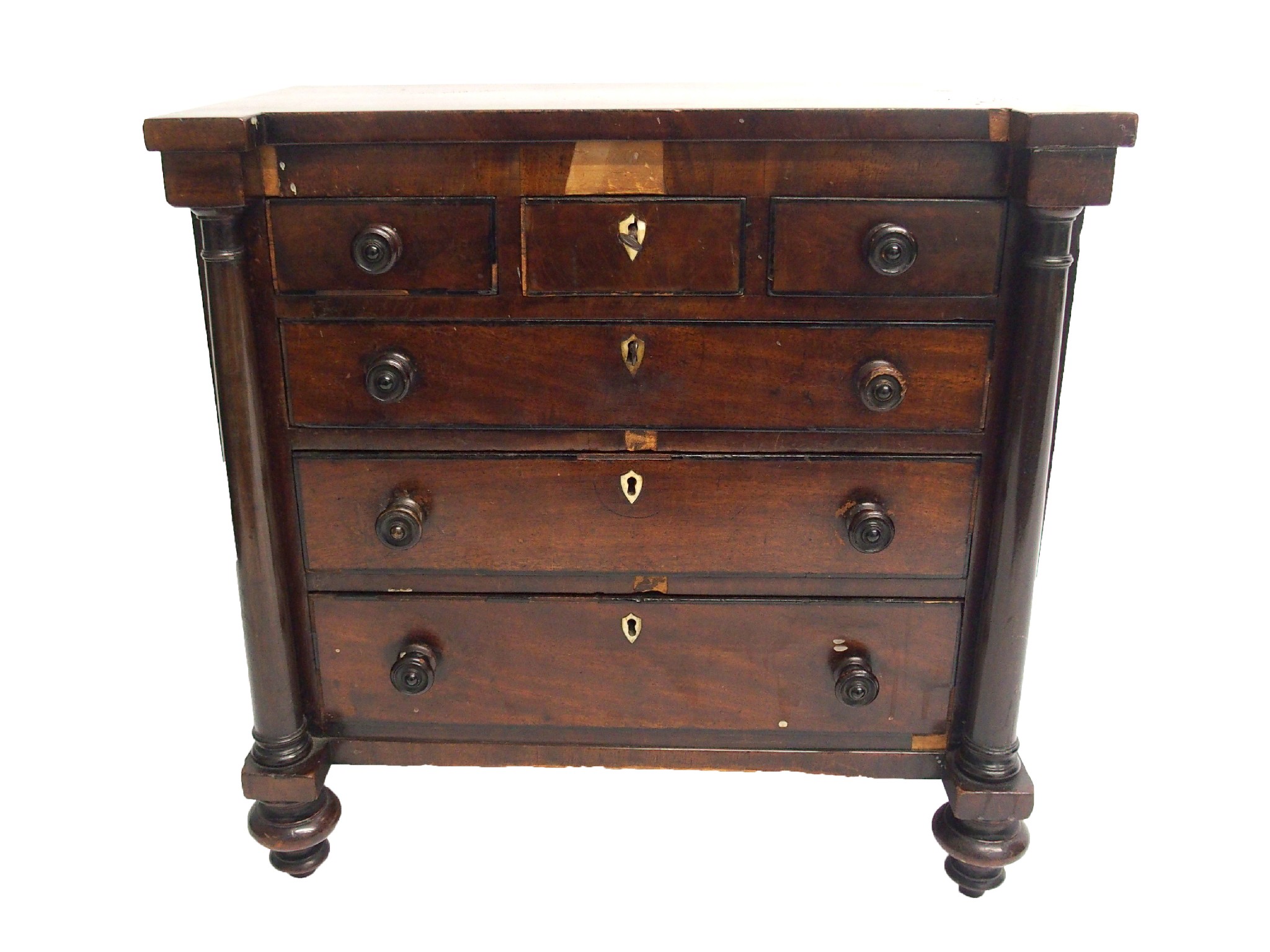 Appraisal: A Victorian mahogany miniature chestwith three short above three long