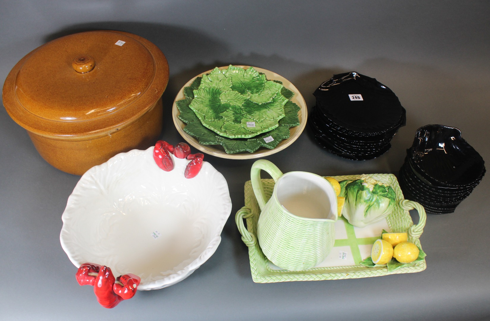 Appraisal: A set of modern black glass scallop shell moulded dishes