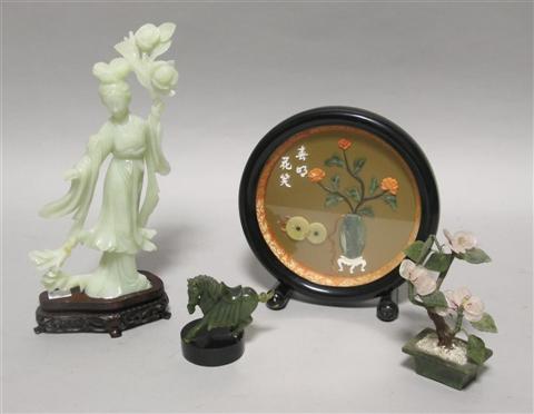 Appraisal: FOUR CHINESE JADE AND HARDSTONE DECORATIONS The first a carved