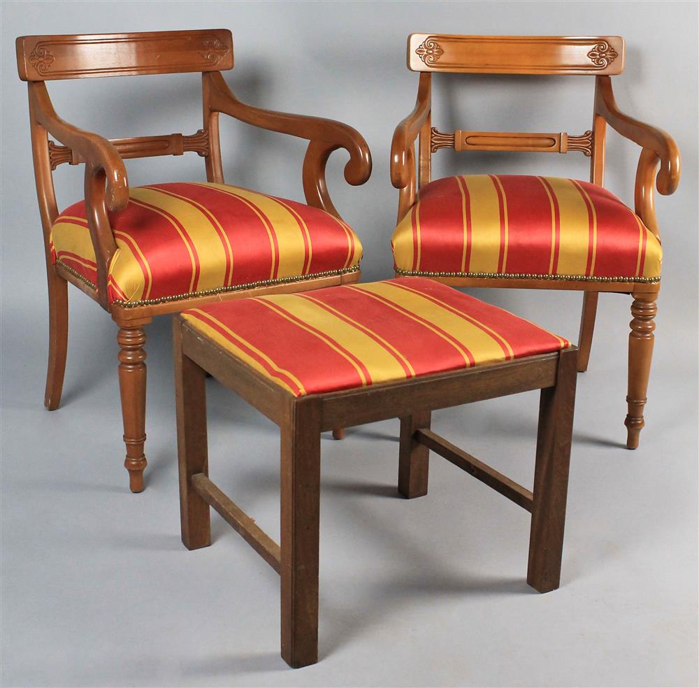 Appraisal: PAIR OF REGENCY STYLE ARMCHAIRS with a footstool in matching