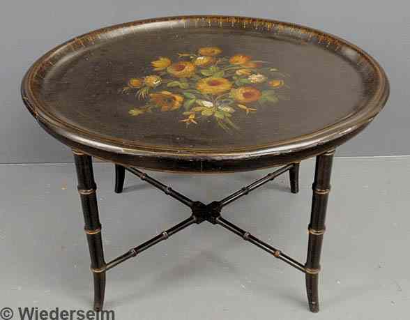 Appraisal: Black lacquer oval tray table with gilt and paint decoration