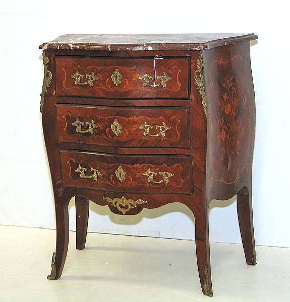 Appraisal: A Louis XVI style gilt metal mounted marquetry commode th