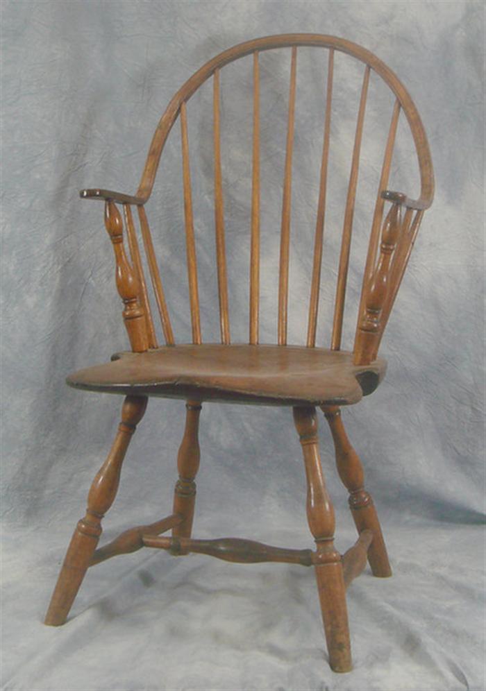 Appraisal: Seven spindle continuous arm Windsor chair h Estimate -