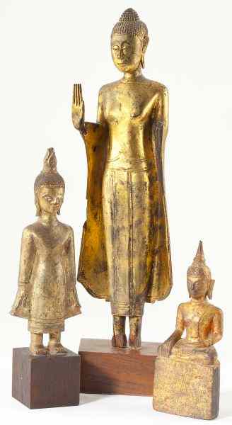 Appraisal: Three Siamese Gilt Buddhas th centuryeach of carved and gilt