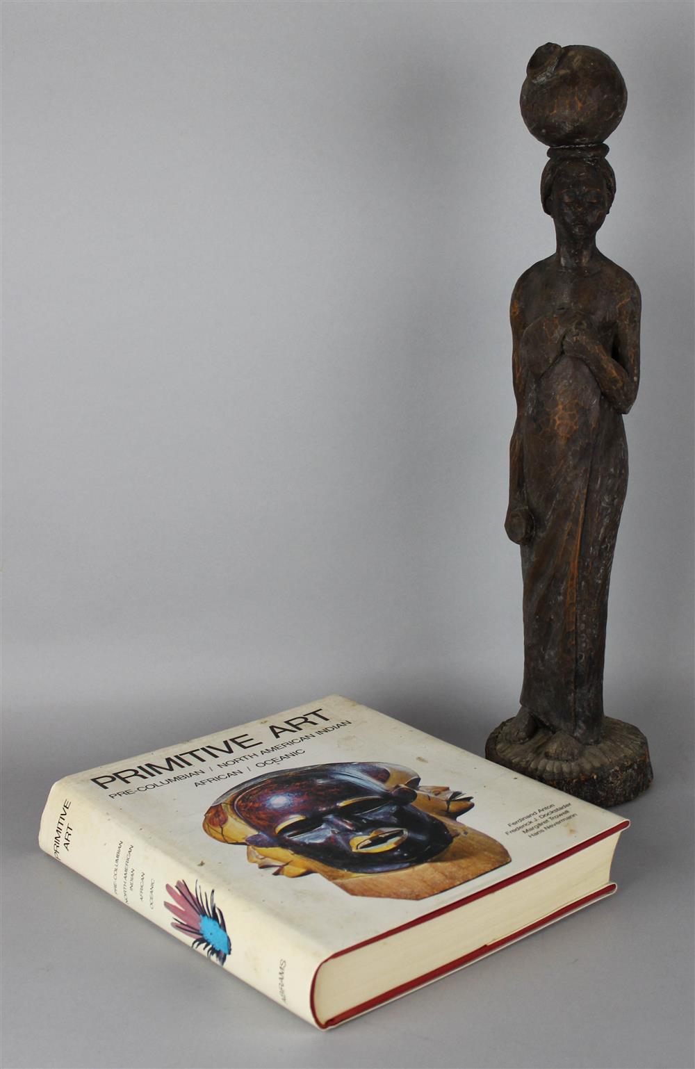 Appraisal: AFRICAN WOOD CARVING OF A WOMAN CARRYING A VESSEL POSSIBLY