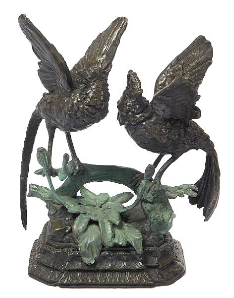 Appraisal: A polychrome bronze figure of two birds height in width